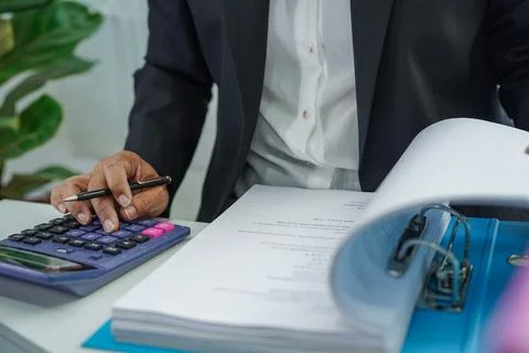 Stack of binder file folder on table in business modern office..on wooden d.. Foto stock