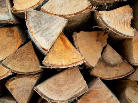 The stack of birch chopped billet closeup with the flow focus. Stock Photos