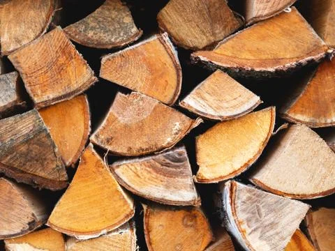 The stack of birch chopped billet closeup with the flow focus. Stock Photos