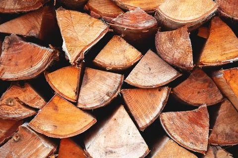 The stack of birch chopped billet closeup with the flow focus. Stock Photos