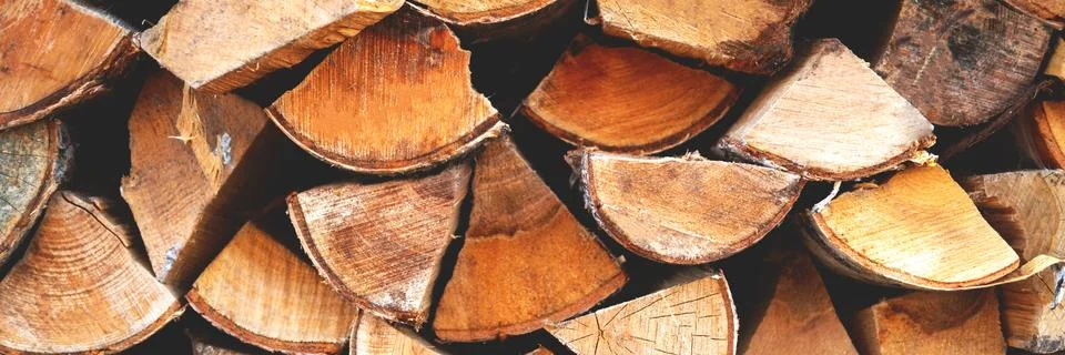 The stack of birch chopped billet with the flow focus. Stock Photos