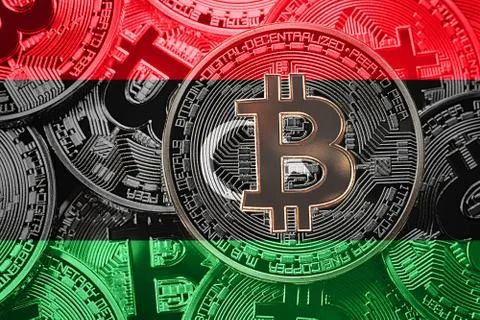 Stack of Bitcoin Libya flag. Bitcoin cryptocurrencies concept. BTC background Stock Photos