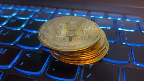 Stack of Bitcoins on Computer Keyboard 動画素材 159359643