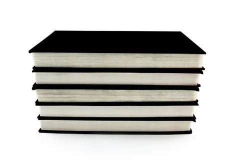 A stack of black books isolated on white background Foto stock