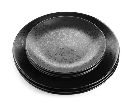 Stack of black ceramic plates isolated on white Stock Photos