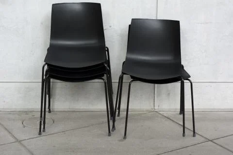 Stack of Black Chairs Stock Photos