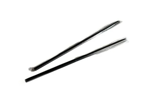 Stack of black plastic drinking straws Foto stock