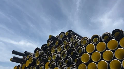Stack of black plastic pipes used for drainage, ventilation, sewage systems 库存影片 337241192