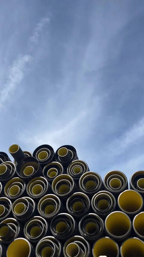 Stack of black plastic pipes used for drainage, ventilation, sewage systems 库存影片 337241244