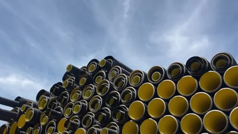 Stack of black plastic pipes used for drainage, ventilation, sewage systems 库存影片 337241248