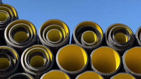 Stack of black plastic pipes used for drainage, ventilation, sewage systems 库存影片 337242040