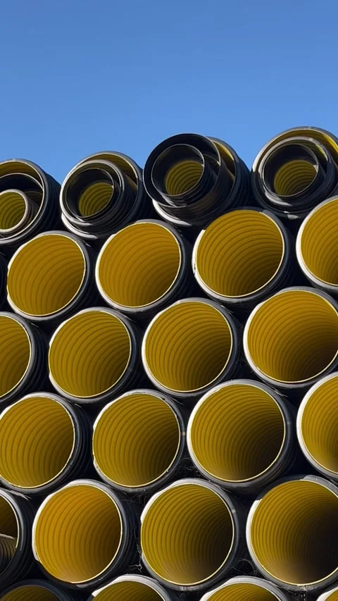 Stack of black plastic pipes used for drainage, ventilation, sewage systems 库存影片 337242047