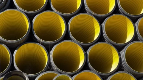 Stack of black plastic pipes used for drainage, ventilation, sewage systems 库存影片 337242066