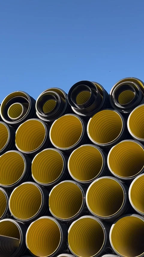 Stack of black plastic pipes used for drainage, ventilation, sewage systems 库存影片 337242101