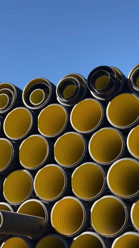 Stack of black plastic pipes used for drainage, ventilation, sewage systems 库存影片 337242195