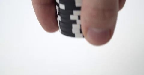 Stack of black poker chips put down Stock Footage 112329545