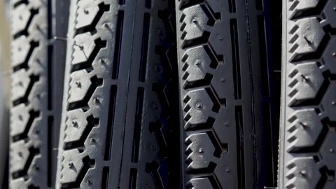 Stack of black replacement bike tires for sale Vídeo Stock 201523144