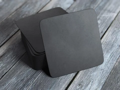 Stack of black square beer coasters. 3d rendering Stock Illustration
