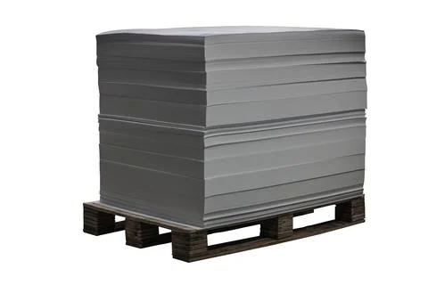 Stack of blank offset paper on a pallet is ready for printing Stock Photos