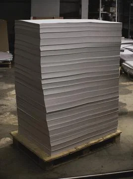 Stack of blank offset paper on a pallet is ready for printing Stock Photos