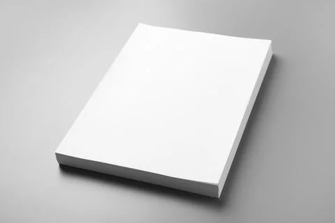 Stack of blank paper sheets for brochure on grey background. Mock up 스톡 사진