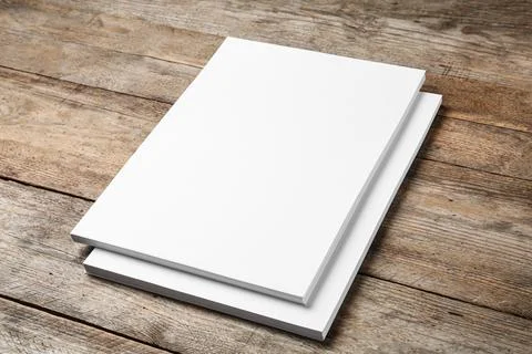 Stack of blank paper sheets for brochure on wooden background. Mock up 스톡 사진