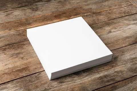 Stack of blank paper sheets for brochure on wooden background. Mock up 스톡 사진