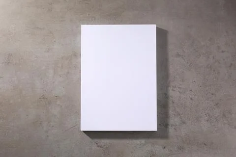 Stack of blank paper sheets on grey textured table, top view. Space for text Stock Photos