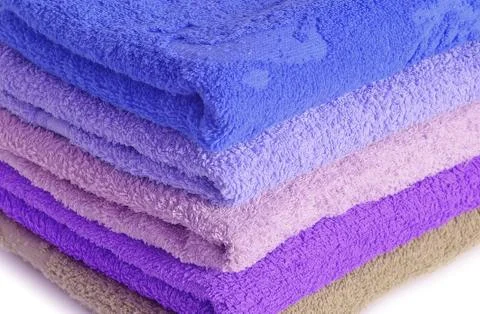 Stack of blue and purple towels Stock Photos
