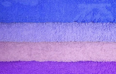 Stack of blue and purple towels Stock Photos