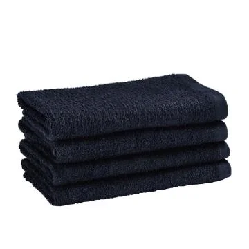 Stack of blue bath towels on isolated background Stock Photos