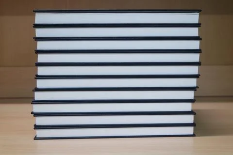 Stack of blue books placed on table. Foto stock