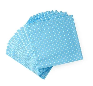Stack of blue dotted paper napkins isolated on white Stock Photos