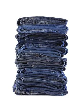 Stack of blue jeans isolated on white background with clipping path Stock-Fotos