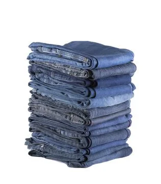 Stack of blue jeans isolated on white background with clipping path Stock-Fotos