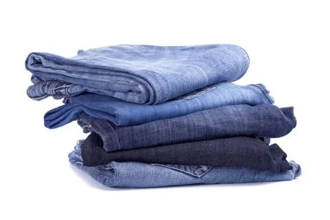 Stack of blue jeans Stock Photos