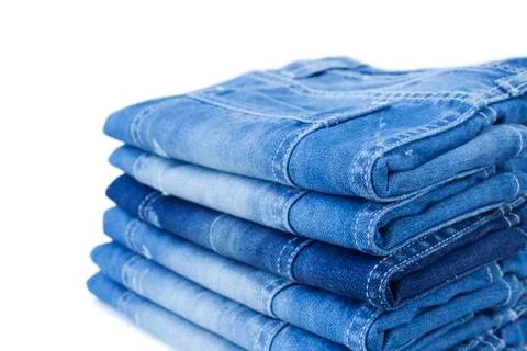 Stack of blue jeans Stock Photos