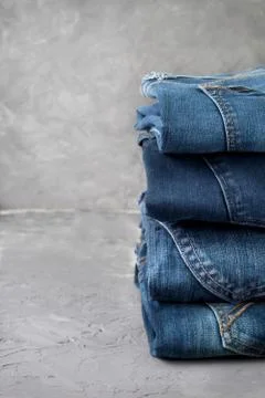 Stack of blue jeans Stock Photos