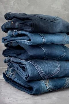 Stack of blue jeans Stock Photos