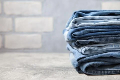 Stack of blue jeans Stock Photos