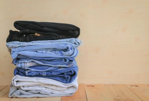 Stack of blue jeans Stock Photos