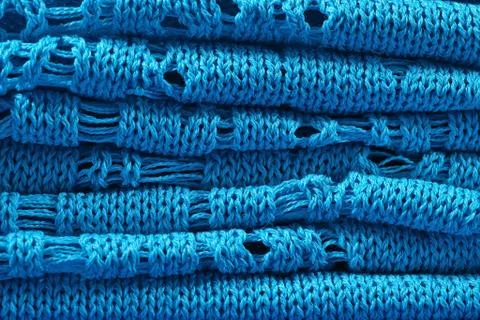 Stack of blue knitted closeup Stock Photos