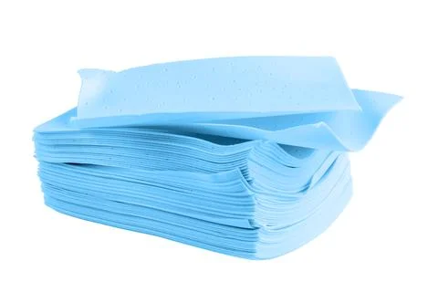 Stack of blue liquidless and powderless laundry detergent squares sheets Stock Photos