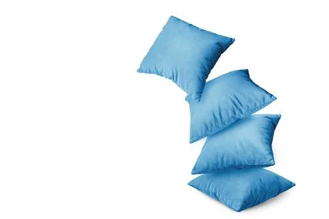 Stack of blue pillows isolated on white background Stock Photos