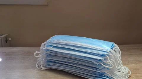  Stack Of Blue Surgical Medical Face Masks  Stock Footage 151914959