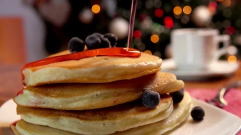 Stack of Blueberry Pancakes with Butter and Maple Syrup. Pancakes with berries. Stock-Footage 336589281