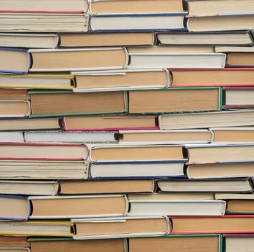 Stack of book background. Wall from books Stock Photos