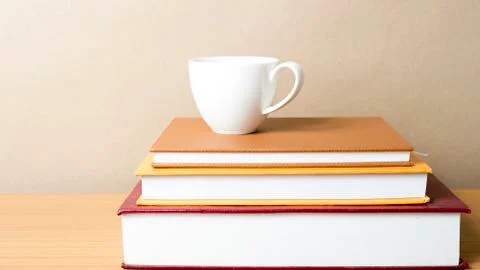 Stack of book with coffee cup Stock Photos