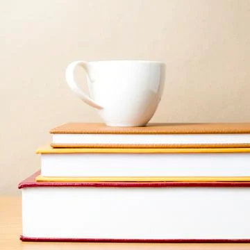 Stack of book with coffee cup Stock Photos