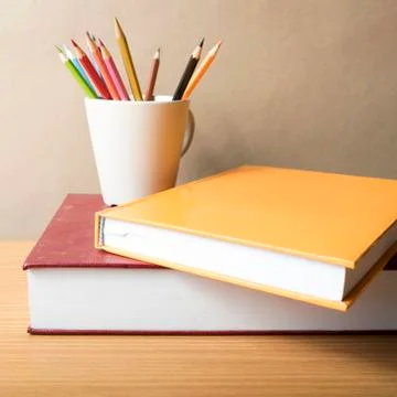 Stack of book with color pencil Stock Photos